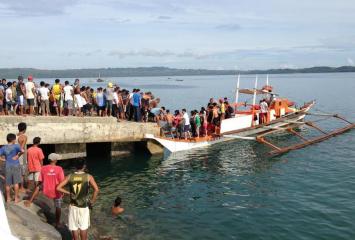 Rescue crew offload survivors of RORO sinking