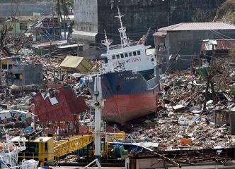 Debris, including ships, litter Tacloban 