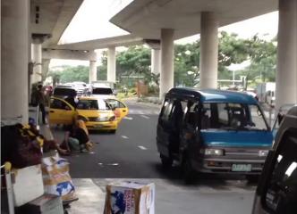 Airport scene after killing of mayor