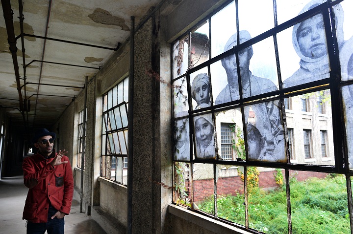 Street artist revisits ghosts of Ellis Island hospital | GMA News