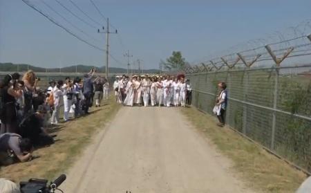 Peace activists make rare crossing of North-South Korea ...