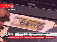 Cops nab gang members making fake P500 bills