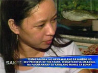   Saksi:   Relatives hit slow retrieval of victims' bodies from ship