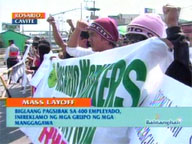  QTV:   Group protests laying off of 400 employees