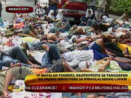 Farmers picket outside office of Mike Arroyo in Makati