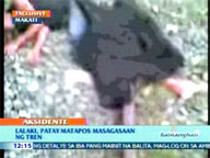   QTV:   Train crushes drunken man sleeping along railroad track