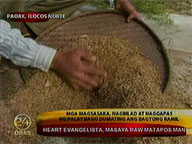 Farmers dry palay before typhoon Ramil comes