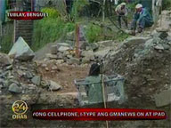 Benguet residents use zipline to receive food supply