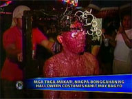  Saksi:  Makati folk whip it up with Halloween costumes despite typhoon