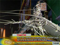 Traffic flow along Samson Road in Caloocan disrupted by fallen electric and phone cables