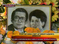 Supporters visit grave of Ninoy and Cory in Manila Memorial Park