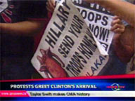  QTV:  Protests greet Hillary Clinton arrival