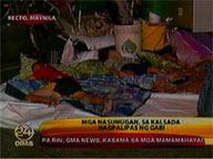 Homeless victims of Manila fire spend night on streets