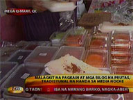Sticky delicacies and round fruits are traditional fare for  media noche 