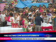  QTV:  Fire victims cope with aftermath