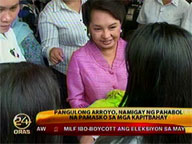 Arroyo distributes Christmas gifts to neighbors