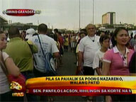 Endless lines of devotees kiss at feet of Black Nazarene