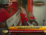 Truck drags, crushes motorbike into wall in Pasig City