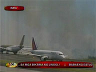 Grassy area along runway scorched by fire