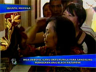   Saksi:  For devotees, it's long hours waiting in line for a brief moment with Black Nazarene