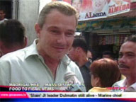 <b>QTV: </b>Madrigal hears mass, ditributes food to fire victims