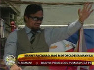 Fans flock to witness Pacquiao motorcade in Manila