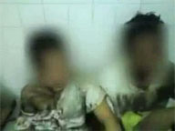 Video of bloodied, handcuffed youth forced to kiss