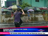   QTV:   Sudden rainshowers fall all over Metro Manila