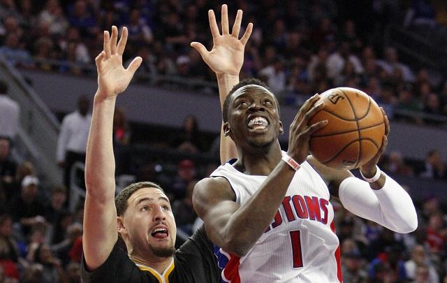 Detroit Pistons guard Reggie Jackson (1) drives to the basket against Golden State Warriors guard Klay Thompson (11) during the second quarter at The Palace of Auburn Hills. The Pistons won 113-95. REUTERS
