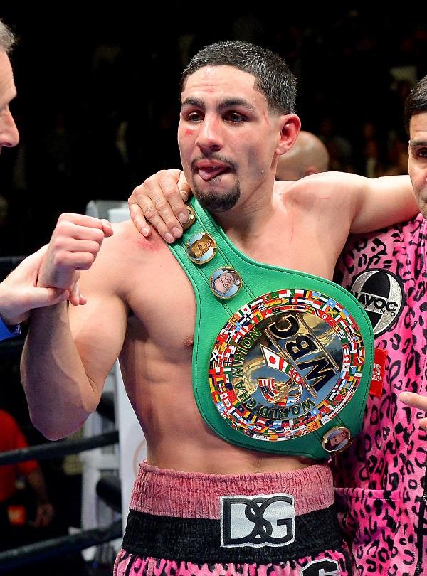  Danny Garcia, pumps his fist after defeating Robert Guerrero (not pictured) during their WBC welterweight boxing title fight at Staples Center. Garcia won by decision. REUTERS