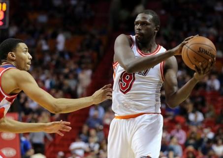Miami Heat forward Luol Deng (9) looks to pass the ball as Washington Wizards forward Otto Porter Jr. (22) defends during the second half at American Airlines Arena. REUTERS