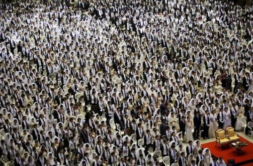 Newlywed couples attend a mass wedding ceremony of the Unification Church at Cheongshim Peace World Center in Gapyeong. REUTERS