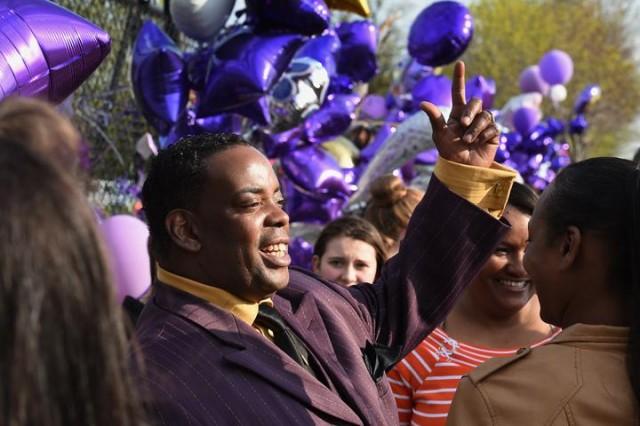 Maurice Phillips, the brother-in-law of Prince, talks with fans following a memorial service held inside the Paisley Park compound of music legend Prince. Photo: Mark Ralston / AFP 