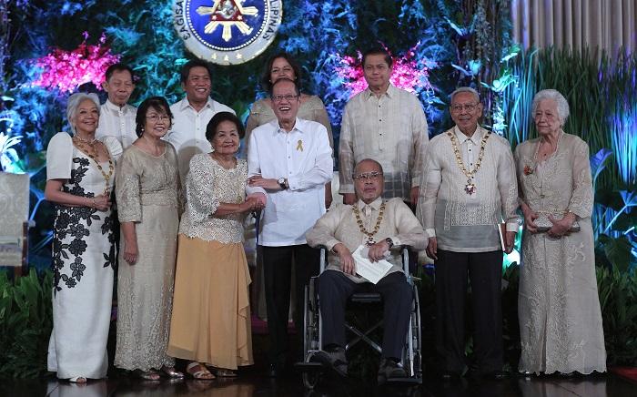 President Benigno Aquino III shares the stage with the Order of National Artist awardees during the conferment ceremonies at the Rizal Hall of the Malaca&Atilde;&plusmn;an Palace on Thursday (April 14). Also in photo are: Alicia Garcia Reyes-Dance, Filomena Coching (wife)-Visual Arts (Postumous), Rebecca Feliciano (wife)-Music (Posthumous), Pilar Zaragoza (wife)-Architecture (Posthumous), Ramon Santos-Music and Cirilo Bautista-Literature. (Photo by Joseph Vidal / Malaca&Atilde;&plusmn;ang Photo Bureau)
