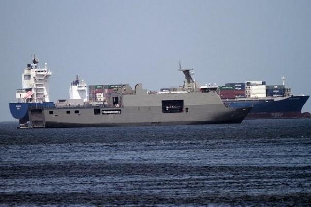 The BRP Tarlac passes a cargo ship as it enters the Manila South Harbor anchorage area. Photo by DANNY PATA, GMA News