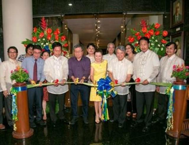 GSIS President and General Manager Robert Vergara (sixth from left) leads the ribbon-cutting ceremony to formally open the exhibit that displays over 800 participating entries in the 2016 GSIS art competition. Vergara is joined by (from left) Ryan Palad, manager, GSIS Corporate Social Advocacy Public Relations Facilities Department; Dionisio Ebdane Jr., SVP, VisMin Operations Group; Roger Santos, Board Member, Art Association of the Philippines (AAP); Romulo Galicano, artist and representational category judge; Mrs. Camille Vergara; Fidel Sarmiento, AAP president; and Danilo Santiago, AAP board member.