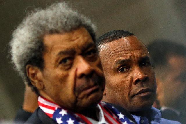 Boxer promoter Don King and Former world champion boxer and Olympic gold medalist Sugar Ray Leonard attend the jenazah, an Islamic funeral prayer, for the late boxing champion Muhammad Ali in Louisville. REUTERS