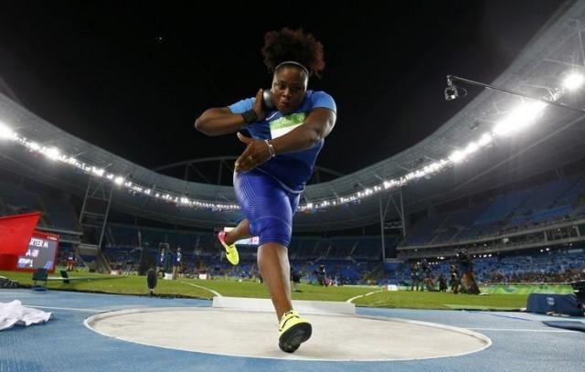 Michelle Carter (USA) of USA competes on her way to the gold medal in the women's shot put. Photo: REUTERS/Kai Pfaffenbach 