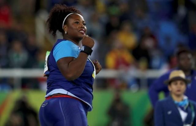 Michelle Carter (USA) of USA celebrates after winning the gold medal in the women's shot put. Photo: REUTERS/Kai Pfaffenbach 