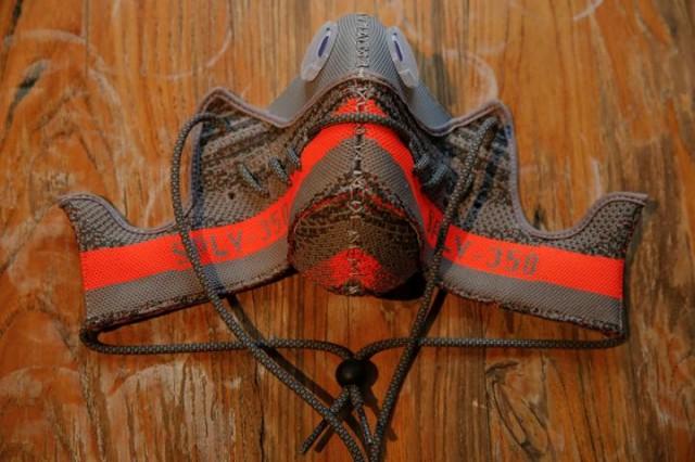 A face mask made by designer Wang Zhijun of a pair of sneakers is arranged to be photographed in Beijing, China December 21, 2016. Photo: REUTERS/Damir Sagolj.