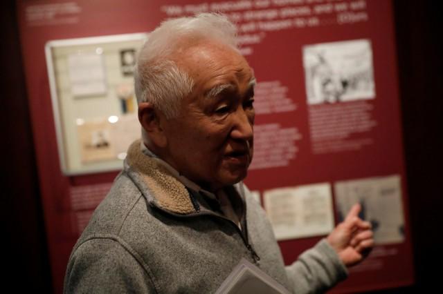Bob Fuchigami, a former detainee at the Granada War Relocation Center, speaks with members of the media during a press preview of "Righting a Wrong: Japanese Americans and WWII" at the Smithsonian National Museum of American History in Washington, U.S., February 17, 2017. REUTERS/Aaron P. Bernstein.