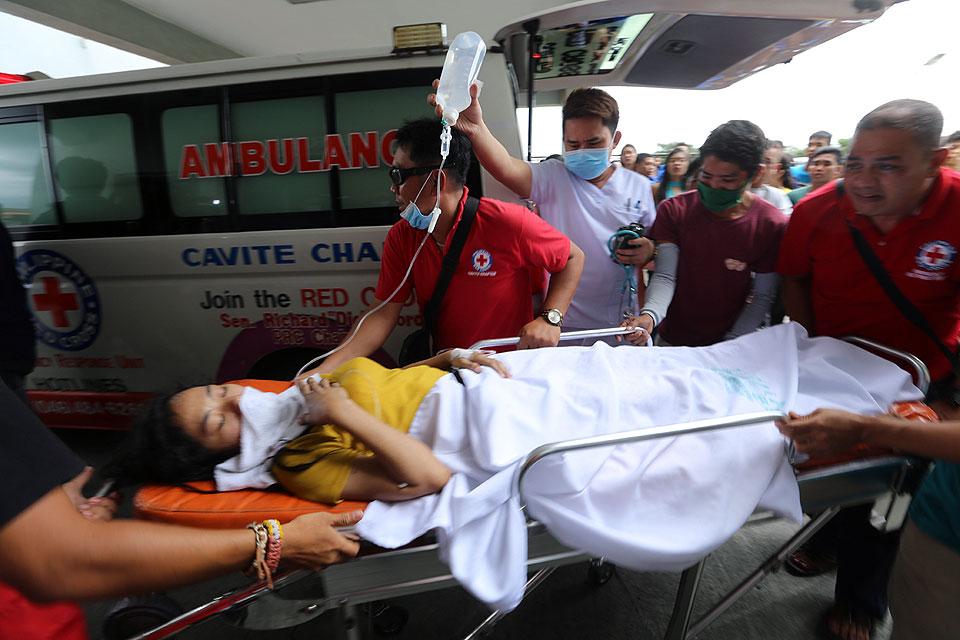 HTI fire victim rushed to hospital | Photos | GMA News Online