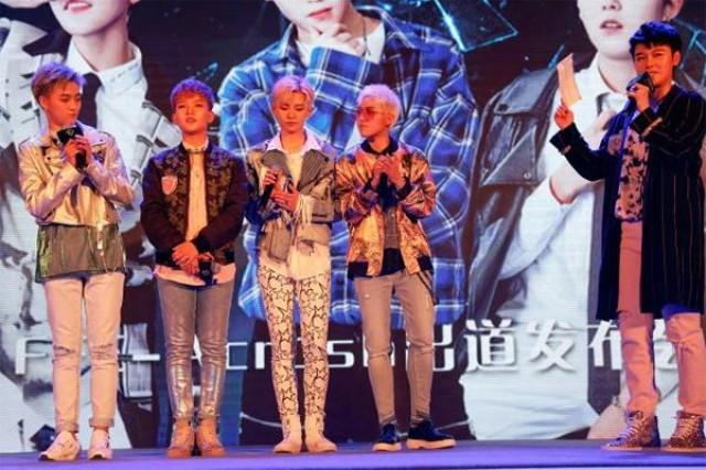 Members of China's all-girl 'boyband' FFC-Acrush appear on the stage during their maiden press conference in Beijing, China April 28, 2017. REUTERS/Damir Sagolj