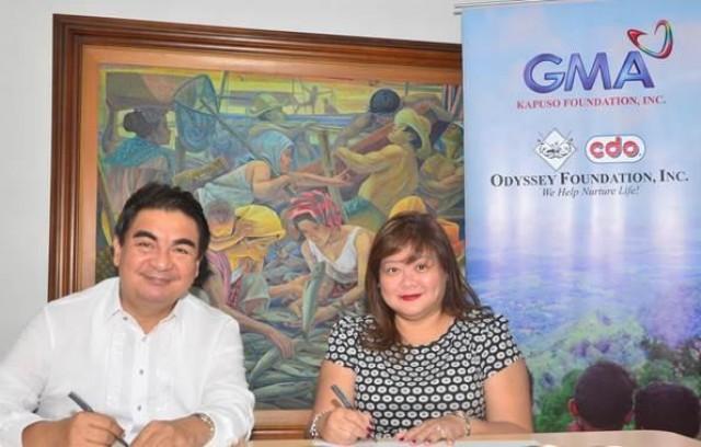 CDO Odyssey Foundation Executive Director Dindo Danao (left) and GMAKF Executive Vice President and COO Rikki Escudero-Catibog (right) during the MOA signing last June 9.