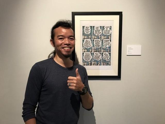 Artist Manix Abrera at the opening