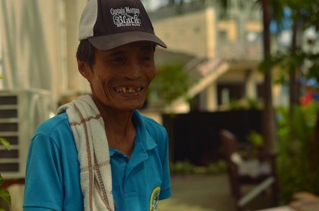 Isidro Bulagao, one of the remaining registered patients, helps with the maintenance of Culion's museum.