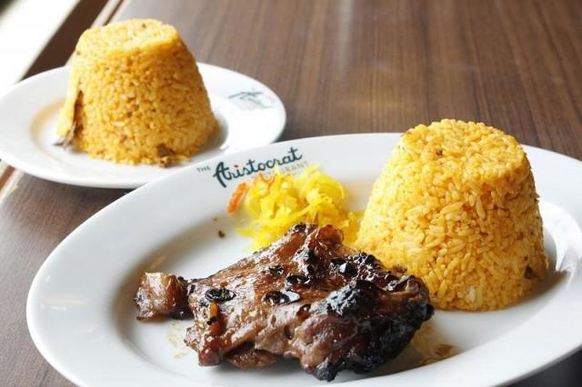 The Aristocratâ€™s signature dish is chicken barbecue. Available in 3-piece or boneless (pictured) variety, it is served with a cup of Java rice, Java sauce, and a side of achara.