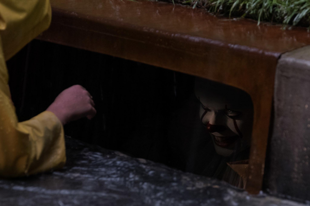 A new but familiar face lurks in the shadows. Image courtesy of Warner Bros. Pictures.