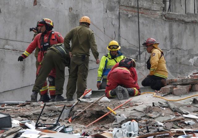 Mexico rescuers in race to find trapped survivors 48 hours after quake