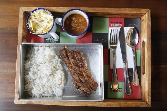 Rackshack&acirc;s Porks Ribs (P245) is served as though it will be eaten in bed.